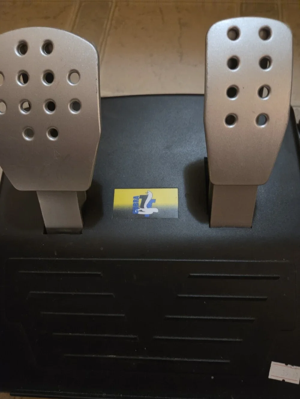 Black and Silver Racing Pedals with Black and Yellow Joystick Controller